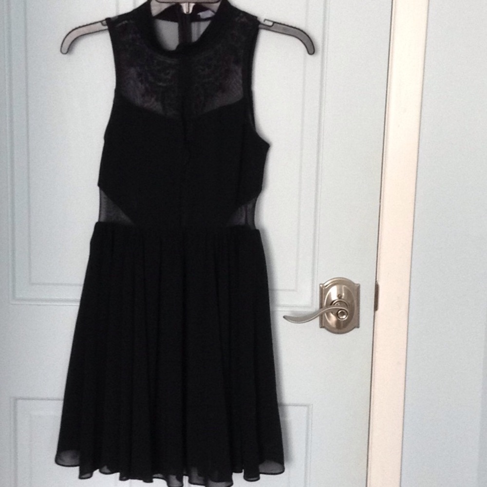 Black skater dress with embroidered detailing